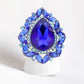Teardrop Stone Centered Round Marquise Stone Trimmed Stretch Ring